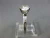 ESTATE 1.17CT DIAMOND PLATINUM 3D ROUND AND BAGUETTE 3 STONE ENGAGEMENT RING