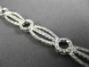 ESTATE WIDE .96CT DIAMOND 14KT WHITE GOLD CLASSIC CIRCLE OF LIFE TENNIS BRACELET