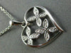 ESTATE .03CT DIAMOND 14K WHITE GOLD FLOWER BUTTERFLY HEART FLOATING LOVE PENDANT