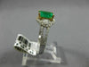 1.44CT DIAMOND & COLOMBIAN EMERALD 14KT 2 TONE GOLD 3 STONE HALO ENGAGEMENT RING