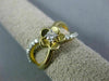 ESTATE .33CT DIAMOND 14KT YELLOW GOLD SOLITAIRE INFINITY FLOWER FRIENDSHIP RING