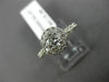 ESTATE .95CT ROUND DIAMOND 14KT WHITE GOLD CLASSIC 4 PRONG HALO ENGAGEMENT RING