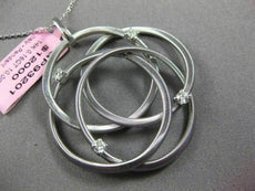 ESTATE LARGE .16CT DIAMOND 14KT WHITE GOLD MULTI CIRCLE FLOWER FLOATING PENDANT