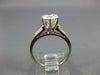 ESTATE 1.17CT DIAMOND PLATINUM 3D ROUND AND BAGUETTE 3 STONE ENGAGEMENT RING