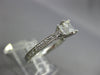 ESTATE .82CT DIAMOND PLATINUM THREE STONE EMERALD CUT FILIGREE ENGAGEMENT RING