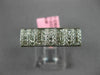 ESTATE .60CT DIAMOND 18KT WHITE GOLD ROUND & PRINCESS INVISIBLE ANNIVERSARY RING