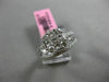 ESTATE 1.32CT ROUND & PRINCESS DIAMOND 18KT WHITE GOLD CLUSTER ENGAGEMENT RING