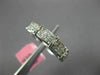 ESTATE .66CT DIAMOND 18KT WHITE GOLD ROUND & PRINCESS INVISIBLE ANNIVERSARY RING