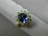 1.83CT DIAMOND & AAA OVAL TANZANITE 14KT YELLOW GOLD FLOWER HALO ENGAGEMENT RING