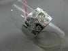 ESTATE WIDE .52CT WHITE & FANCY YELLOW DIAMOND 18KT WHITE GOLD FLOWER LOVE RING