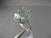 ESTATE LARGE 9.70CTW DIAMOND & AAA GREEN AMETHYST 14KT WHITE GOLD OVAL HALO RING
