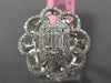 ESTATE LARGE .78CT ROUND & BAGUETTE DIAMOND 18KT WHITE GOLD FLOWER COCKTAIL RING