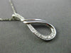 ESTATE .03CT DIAMOND 14KT WHITE GOLD 3D LOVE KNOT SEMI INFINITY FLOATING PENDANT