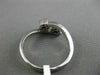 ESTATE .25CT ROUND DIAMOND 14KT WHITE GOLD 3D DOUBLE FLOWE INFINITY LOVE RING
