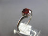 1.17CT DIAMOND & AAA GARNET 14KT WHITE GOLD 3D CUSHION & ROUND 3 STONE LOVE RING