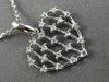 ESTATE .18CT DIAMOND 14KT WHITE GOLD 3D OPEN HEART CLUSTER FLOATING LOVE PENDANT