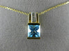 ESTATE 1.46CT DIAMOND & AAA BLUE TOPAZ 14KT 2 TONE GOLD ROUND & PRINCESS PENDANT