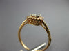 ESTATE .50CT DIAMOND 18KT ROSE GOLD ROUND & BAGUETTE CLUSTER HALO PROMISE RING