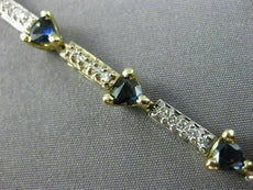 ESTATE 5.04CT DIAMOND & AAA TRILLION SAPPHIRE 14KT TWO TONE GOLD TENNIS BRACELET