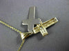 ESTATE .15CT DIAMOND 14KT TWO TONE GOLD SOLITAIRE FLOATING CROSS PENDANT #11344