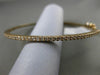 ESTATE .50CT DIAMOND 14KT ROSE GOLD 3D 2mm CLASSIC SHARE PRONG BANGLE BRACELET