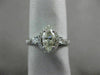 ESTATE .78CT WHITE & YELLOWW DIAMOND 18K WHITE GOLD CLASSIC HALO ENGAGEMENT RING