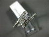 ESTATE .56CT DIAMOND 14KT WHITE GOLD 2 STONE CRISS CROSS SEMI ETERNITY LOVE RING