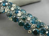 ESTATE EXTRA LARGE 56.98CT WHITE & BLUE DIAMOND 18KT WHITE GOLD TENNIS BRACELET