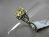 ESTATE 1.82CTW GIA FANCY YELLOW DIAMOND 18KT WHITE GOLD HALO ENGAGEMENT RING