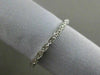 ESTATE .10CT DIAMOND 14KT WHITE GOLD FILIGREE ETERNITY WEDDING ANNIVERSARY RING