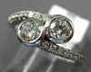 ESTATE .68CT DIAMOND 14KT WHITE GOLD 3D TWO STONE CRISS CROSS INFINITY LOVE RING