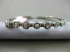 ESTATE .60CT DIAMOND 14KT WHITE GOLD 3D 9 STONE ETOILE FLEXIBLE BANGLE BRACELET