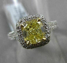 ESTATE 2.26CTW GIA FANCY YELLOW DIAMOND 18KT WHITE GOLD HALO ENGAGEMENT RING