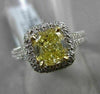 ESTATE 2.26CTW GIA FANCY YELLOW DIAMOND 18KT WHITE GOLD HALO ENGAGEMENT RING