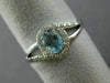 ESTATE .48CT DIAMOND & AAA OVAL CUT AQUAMARINE 14KT WHITE GOLD 3D LOVE KNOT RING