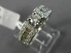 ESTATE .90CT ROUND & BAGUETTE DIAMOND 14KT WHITE GOLD FOUR PRONG ENGAGEMENT RING