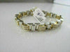 ESTATE WIDE 14K TWO TONE PRINCESS CUT DIAMOND BRACELET