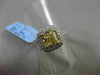 ESTATE 1.89CT GIA FANCY YELLOW DIAMOND 18KT WHITE GOLD HALO ENGAGEMENT RING