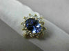 1.83CT DIAMOND & AAA OVAL TANZANITE 14KT YELLOW GOLD FLOWER HALO ENGAGEMENT RING