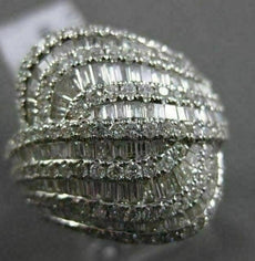 ESTATE 2.15CT BAGUETTE & ROUND DIAMOND 18KT WHITE GOLD INTERTWINNING FUN RING
