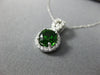 ESTATE 1.20CT DIAMOND & AAA GREEN GARNET 14KT WHITE GOLD ROUND INFINITY PENDANT