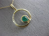 ESTATE .03CT DIAMOND & AAA EMERALD 14KT YELLOW GOLD CIRCLE OF LIFE FUN PENDANT