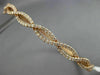 ESTATE WIDE 1.02CT DIAMOND 14KT ROSE GOLD INFINITY SEMI ETERNITY BANGLE BRACELET