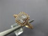 ESTATE .50CT DIAMOND 18KT ROSE GOLD ROUND & BAGUETTE CLUSTER HALO PROMISE RING