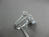 ESTATE .64CT ROUND DIAMOND 18KT WHITE GOLD 3D CLUSTER DOUBLE FLOWER LOVE RING