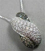 ESTATE 14KT WHITE 1.5CT X SHAPE BLACK & WHITE DIAMOND PENDANT