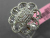 ESTATE LARGE .78CT ROUND & BAGUETTE DIAMOND 18KT WHITE GOLD FLOWER COCKTAIL RING