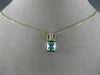 ESTATE 1.46CT DIAMOND & AAA BLUE TOPAZ 14KT 2 TONE GOLD ROUND & PRINCESS PENDANT