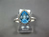 1.17CT DIAMOND & AAA BLUE TOPAZ 14K WHITE GOLD PEAR SHAPE & ROUND HALO LOVE RING