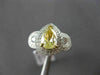 ESTATE 1.64CT FANCY YELLOW DIAMOND 18K TWO TONE GOLD DOUBLE HALO ENGAGEMENT RING